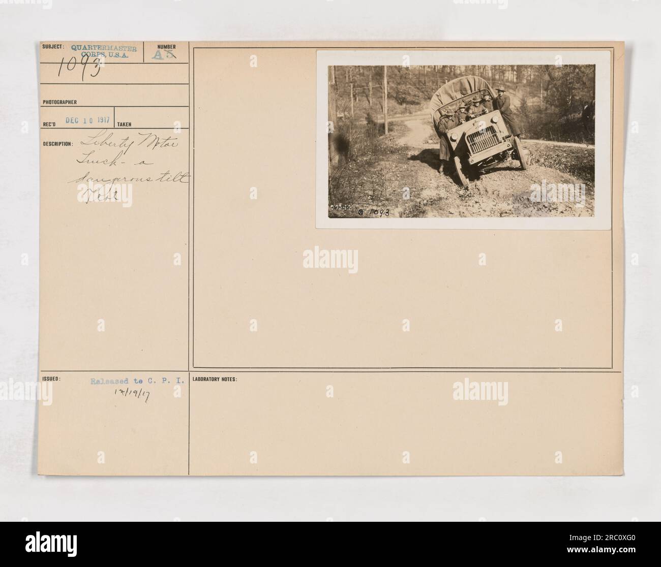 A Liberty Motor Truck going through a dangerous tilt test at the Quartermaster Corps during World War One. This photograph, labeled as 111-SC-1093, was taken on December 10, 1917, and released to the C. P. I. Laboratory. It showcases the testing process for the Liberty Motor Trucks. Stock Photo