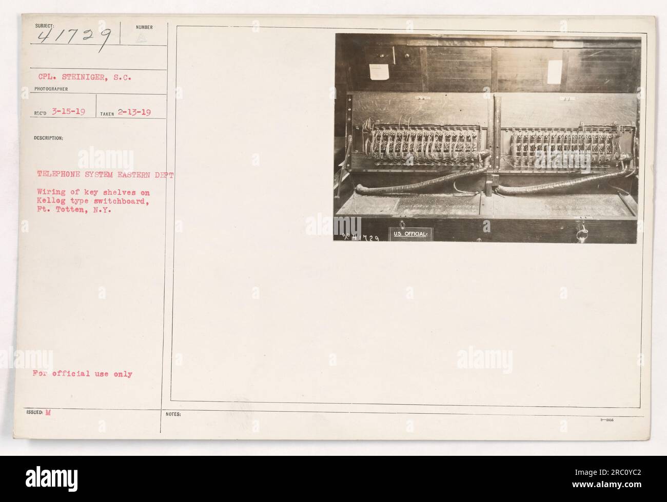 CPL. Steiniger, a photographer for the Signal Corps, captured this image on February 13, 1919, at Pt. Totten, New York. It shows the wiring of key shelves on a Kellog type switchboard, part of the number telephone system used by the Eastern Department during World War I. This photograph is for official use only. Stock Photo