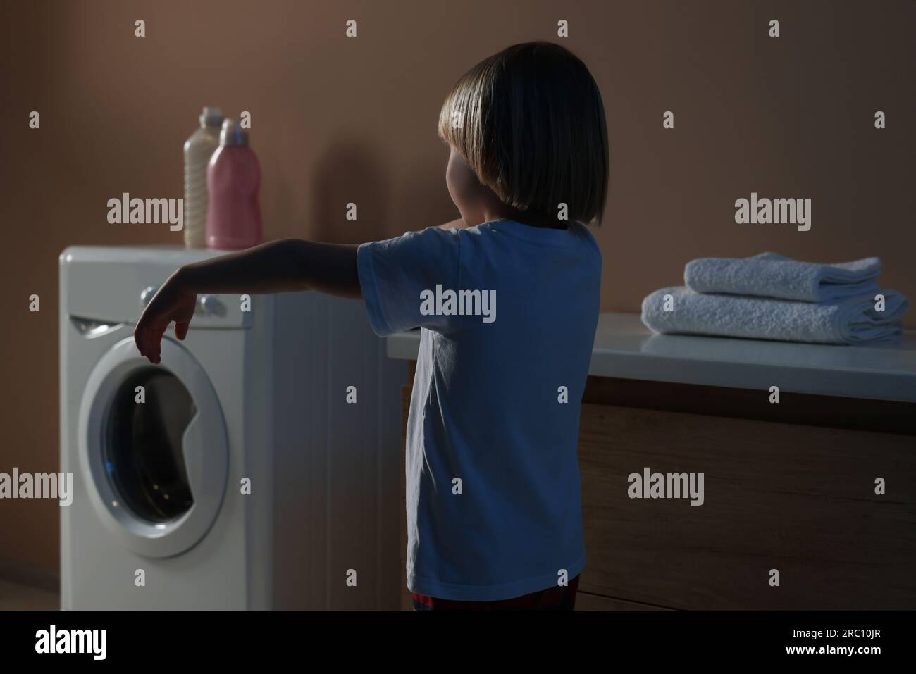 Boy in pajamas sleepwalking indoors at night Stock Photo Alamy
