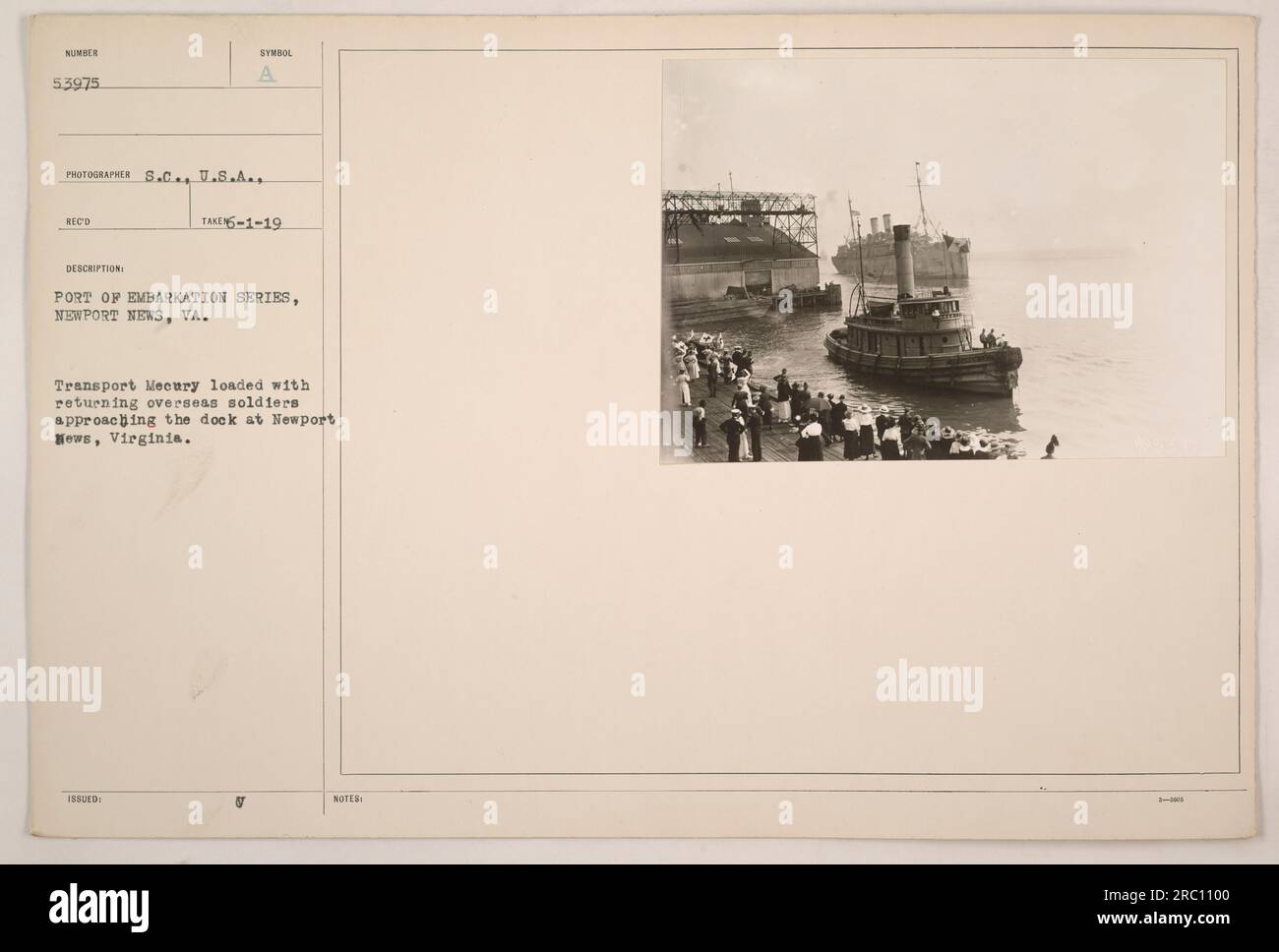 Transport Mecury bringing home overseas soldiers arrives at the dock in Newport News, Virginia. The photograph was taken on June 1, 1919, as part of the Port of Embarkation series. The soldiers, who were returning from overseas service, can be seen on the vessel. Stock Photo