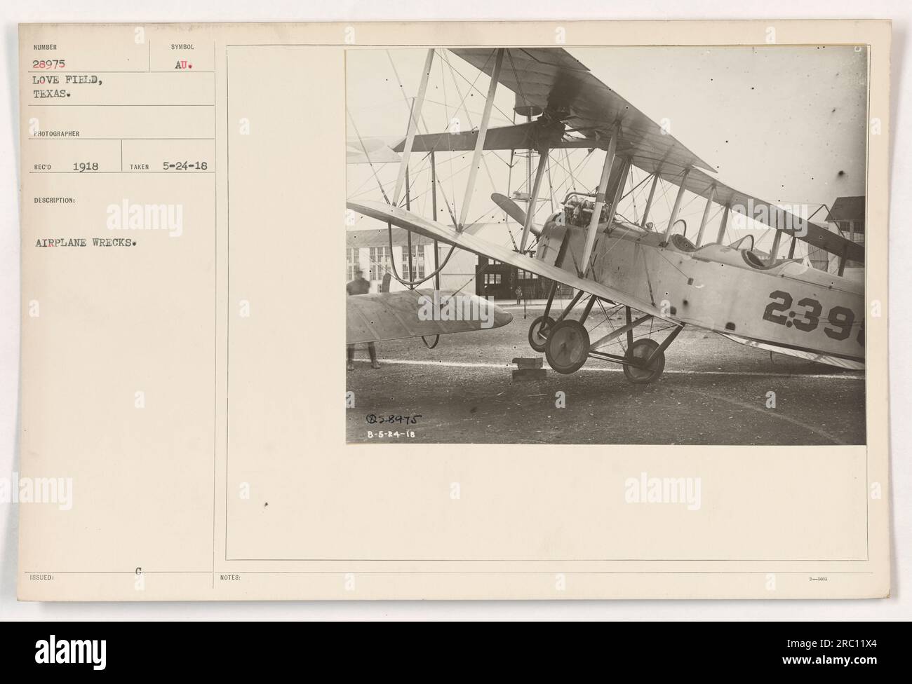 This photograph 111-SC-28975 was taken in Love Field, Texas in 1918. It shows the wreckage of airplanes. The photographer noted the date as May 24, 1918 and the symbol AU was issued. Further information indicated that the image was numbered 5.8975 and taken on August 5, 1918 at 2:39 PM. Stock Photo