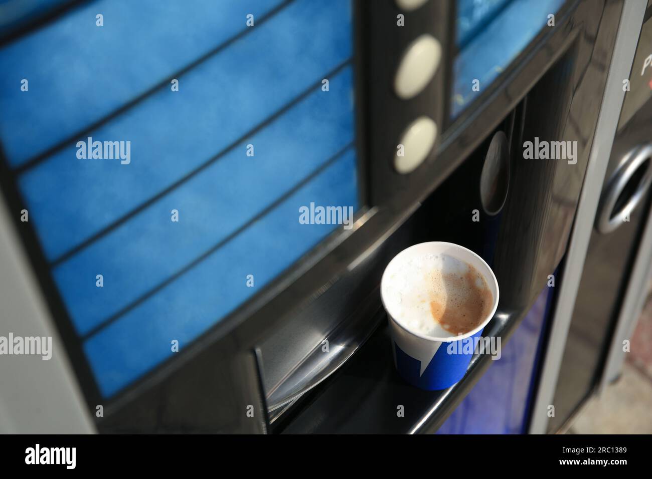 Coffee vending machine with paper cup on drip tray, above view Stock ...
