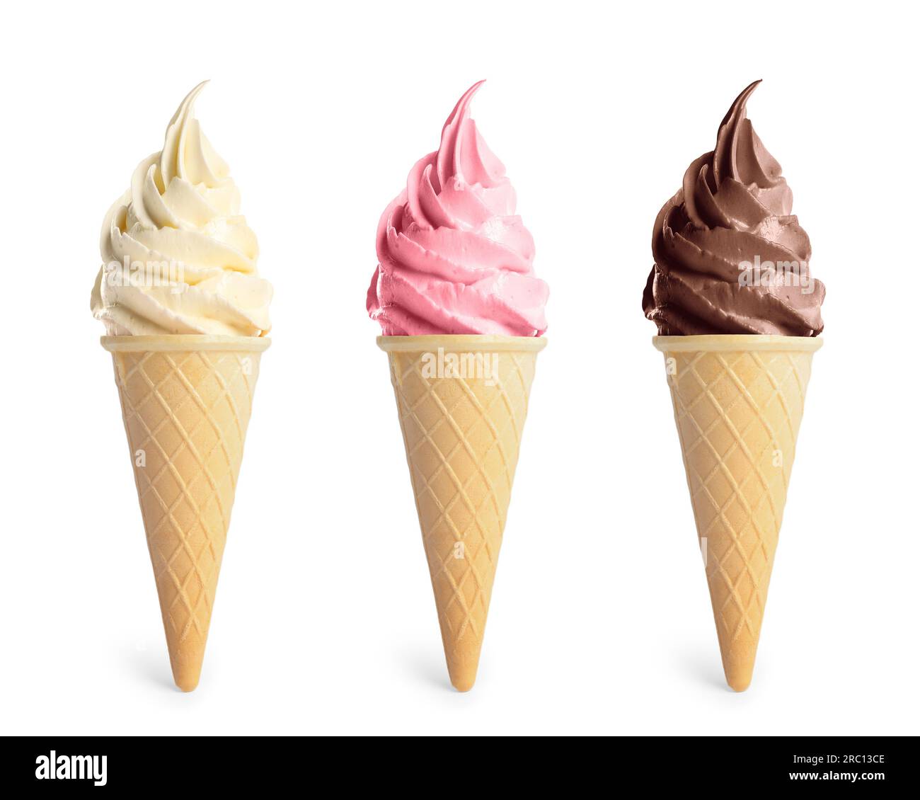 Set of different delicious soft serve ice creams in crispy cones on
