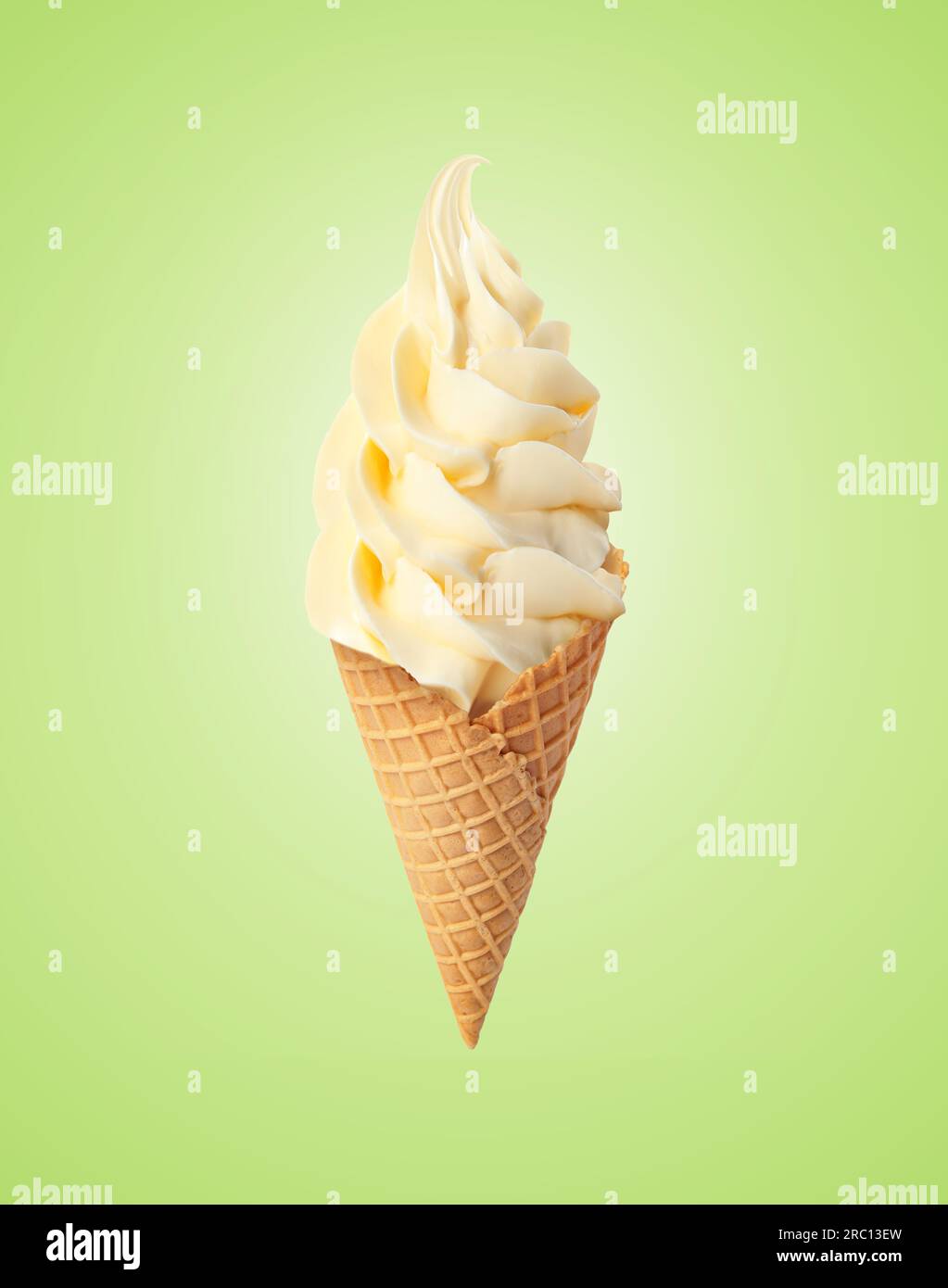 Delicious Soft Serve Vanilla Ice Cream In Crispy Cone On Pastel Green
