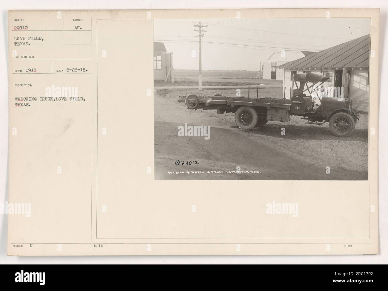 Wrecking truck at Love Field, Texas, photographed in 1918. The image shows a symbol labeled '188LED C AU' and is taken on August 28, 1918. A note with the number #H 29012 503 and date 5-89-18 mentions a WWE truck at Love Field, Texas that was involved in KWA 3-MG. Stock Photo