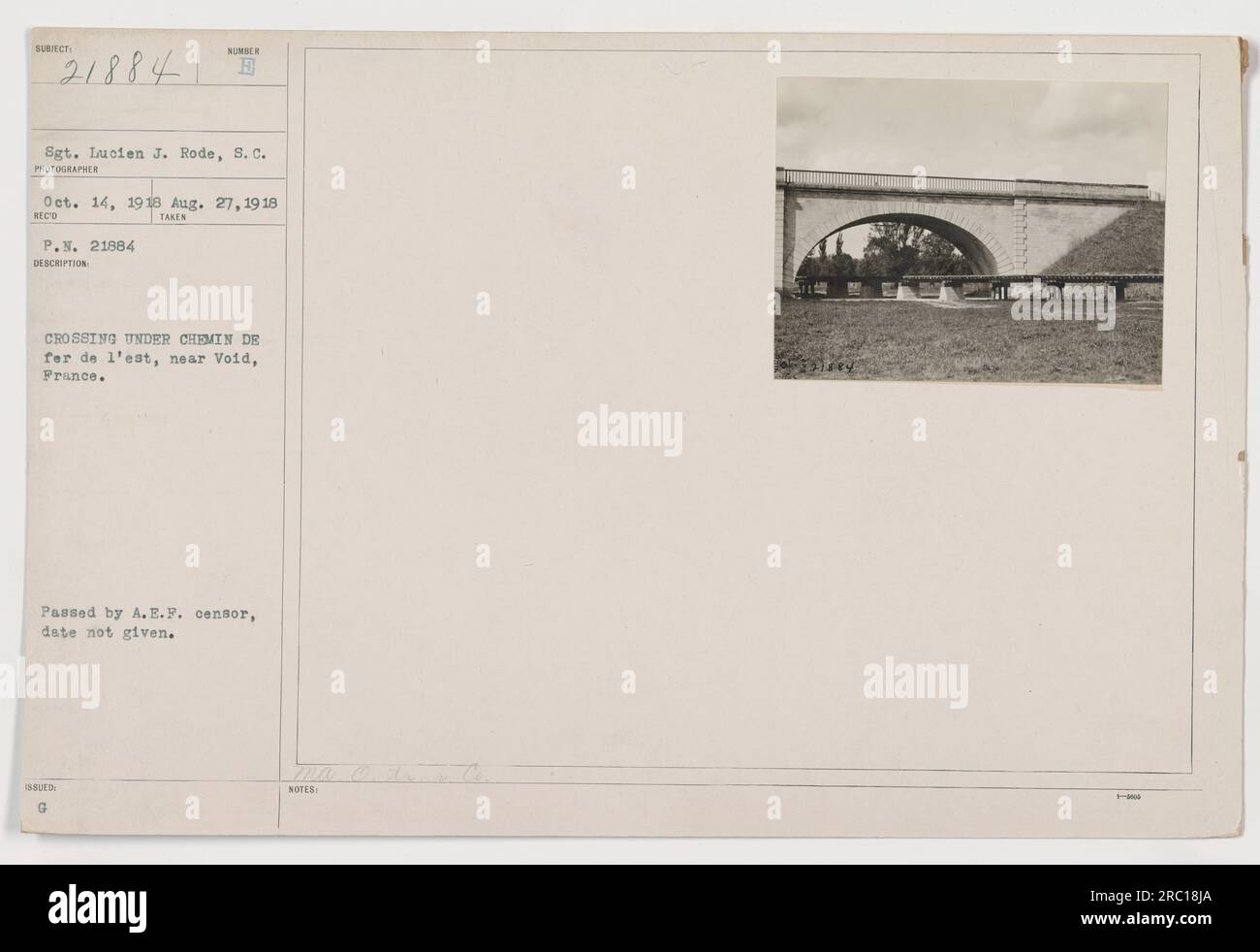 Soldier Sgt. Lucien J. Rode is pictured crossing under the Chemin de fer de l'est railway near Void, France on August 27, 1918. This photograph was taken for official military documentation and was passed by the A.E.F. censor. Stock Photo