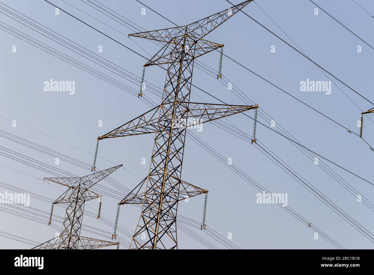 High voltage power lines - metal power grid. Taken in Toronto, Canada. Stock Photo