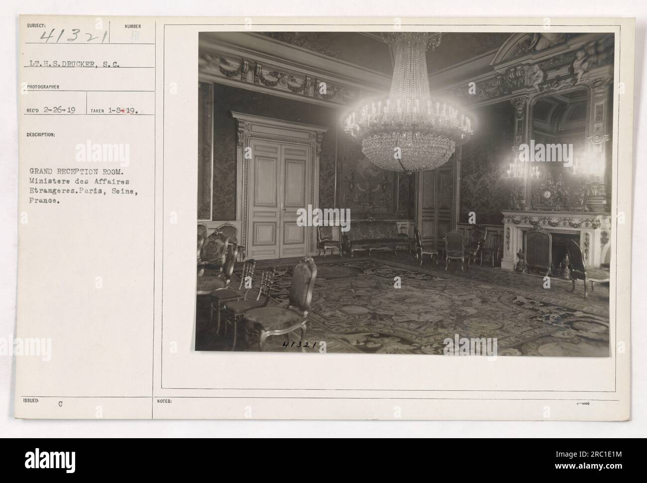 Lieutenant H.S. Drucker, a photographer from the Signal Corps, captured this image on January 8, 1919, in the Grand Reception Room of the Ministere des Affaires Etrangeres in Paris, France. The purpose of capturing this scene is not specified in the provided information. Stock Photo