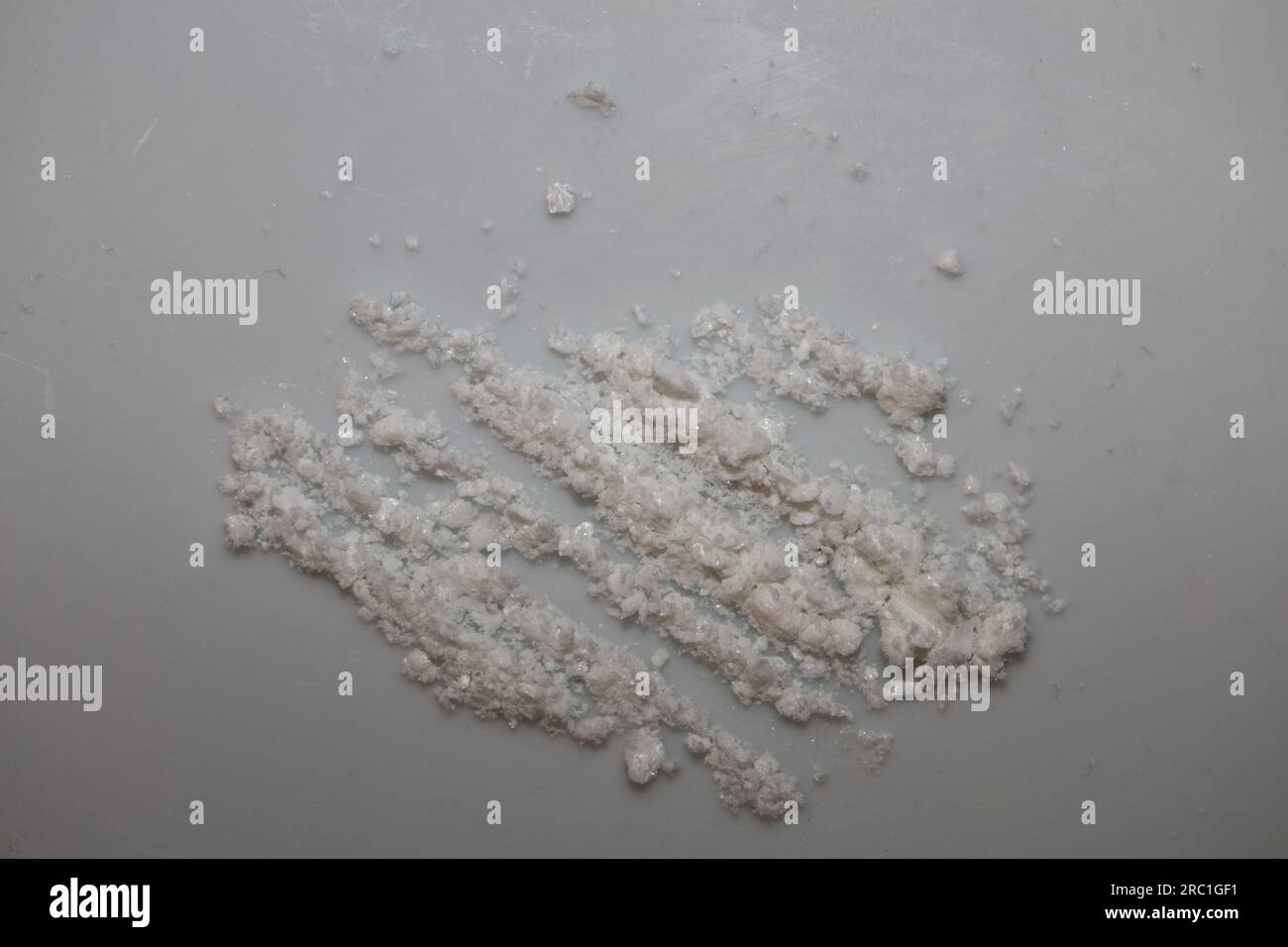 Cocaine lines on white plate close up dope background high quality big