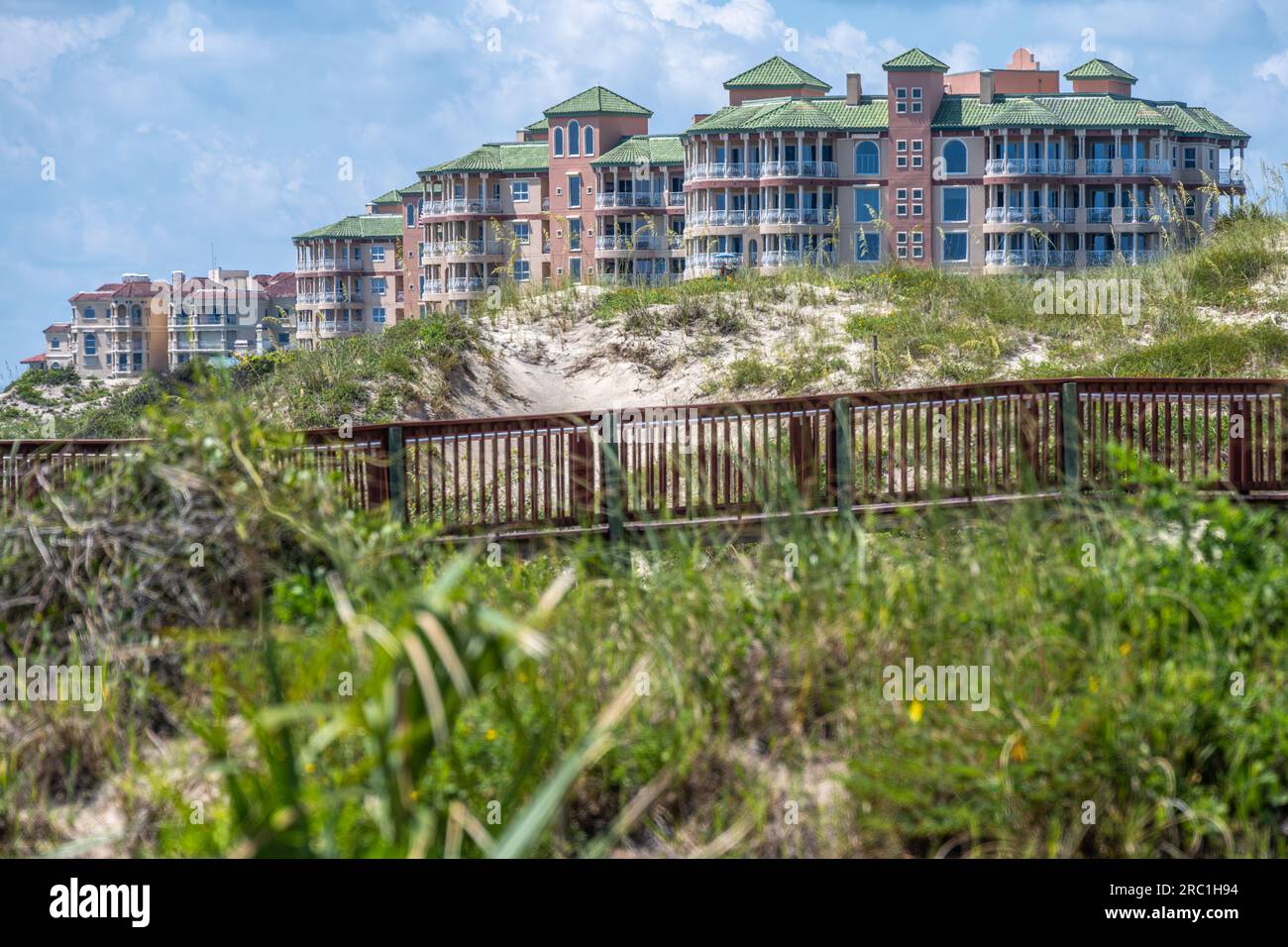 View of Burney Beach boardwalk and luxury oceanfront condominiums on Amelia Island in Northeast Florida. (USA) Stock Photo