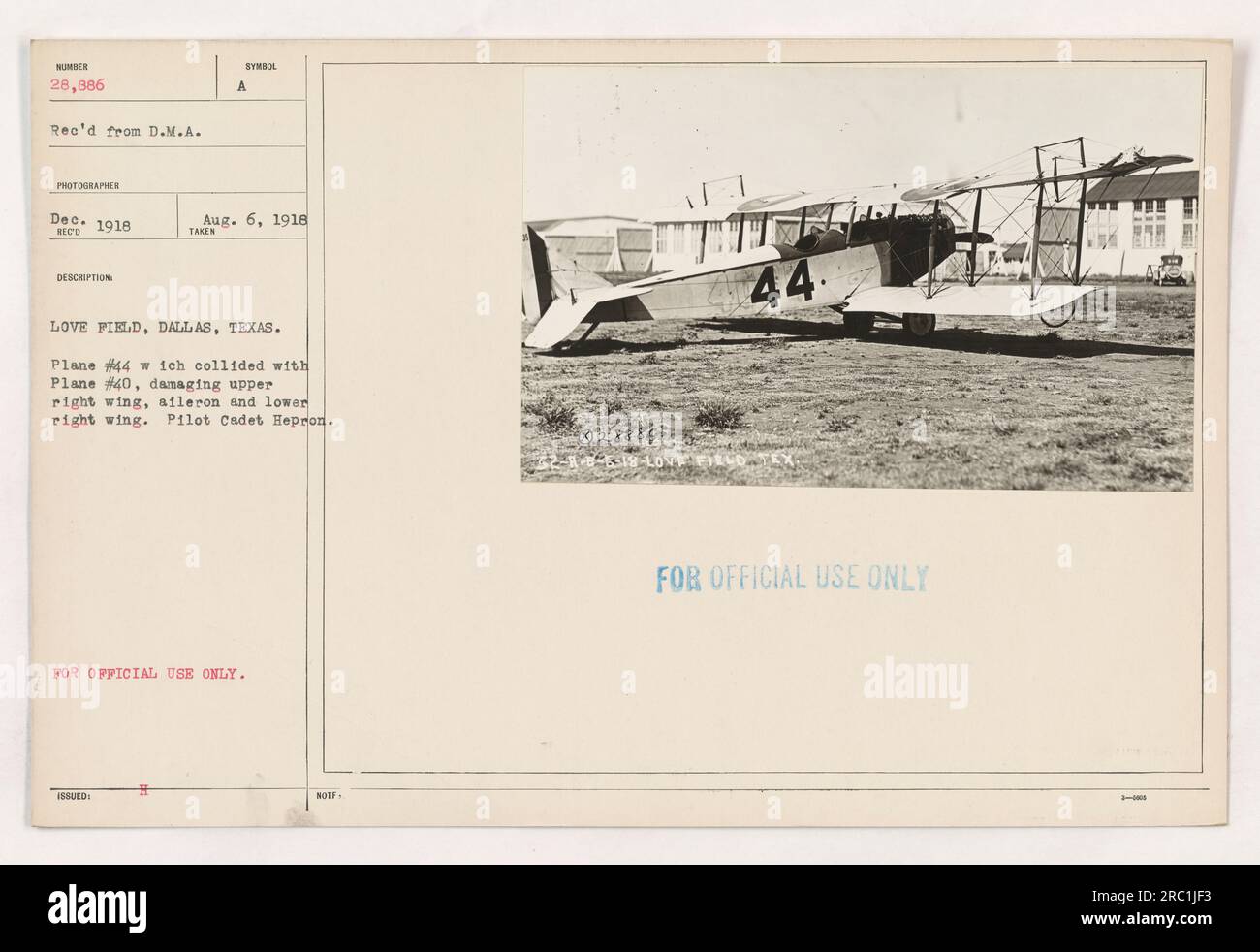 American military plane #44 collides with plane #40 at Love Field in Dallas, Texas on August 6, 1918. The collision results in damage to the upper right wing, aileron, and lower right wing of plane #44. The pilot of plane #44 is Cadet Hepron. This information is marked as 'FOR OFFICIAL USE ONLY.' Stock Photo