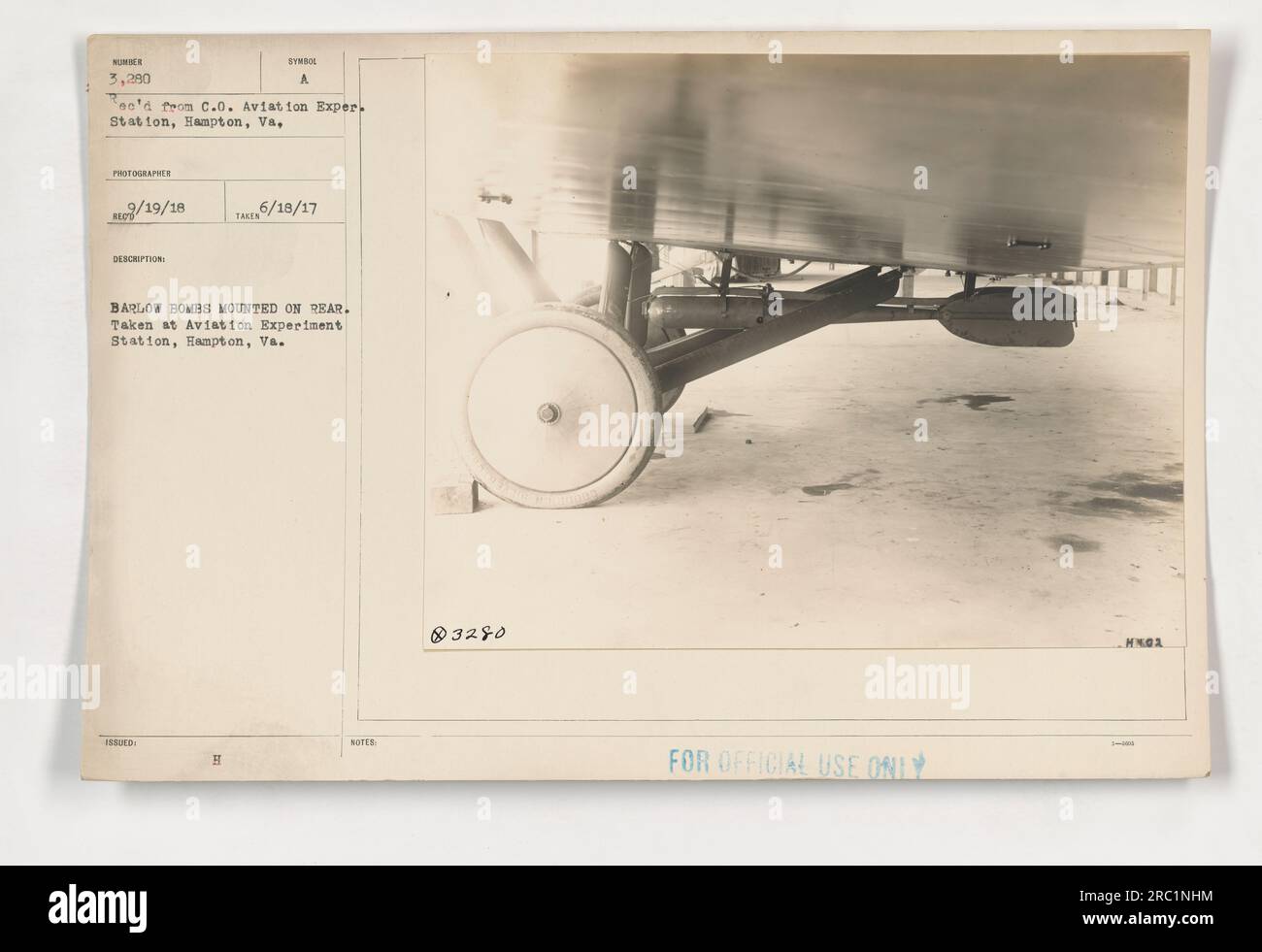 '111-SC-3280 - Barlow Bombs mounted on Rear. This photograph was taken at the Aviation Experiment Station in Hampton, VA. The image shows Barlow bombs symbolically placed on the rear. It was captured on June 18, 1917, with the official use limited to authorized personnel.' Stock Photo