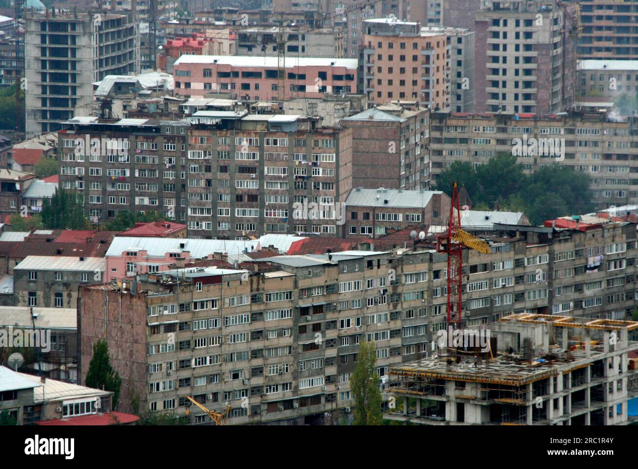 Old and newly emerging prefabricated buildings in the city centre of