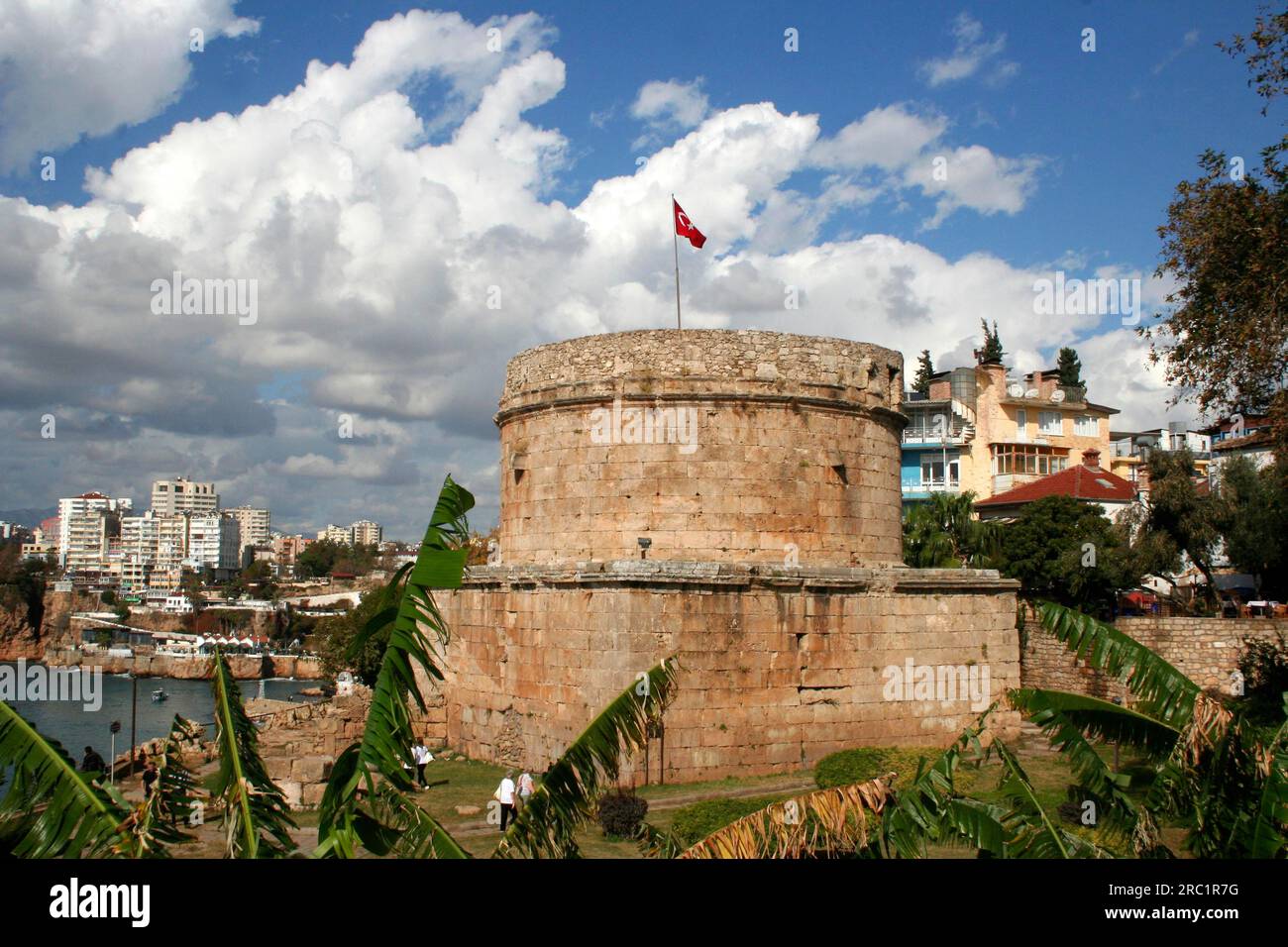 The Hidirlik Kulesi, an old stone tower on the outskirts of the old town of Antalya, above the harbour, Turkey Stock Photo