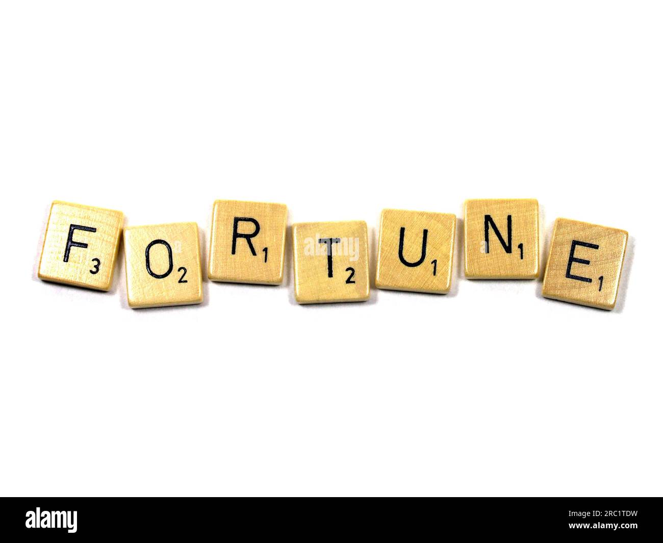 Fortune written with scrabble stones Stock Photo
