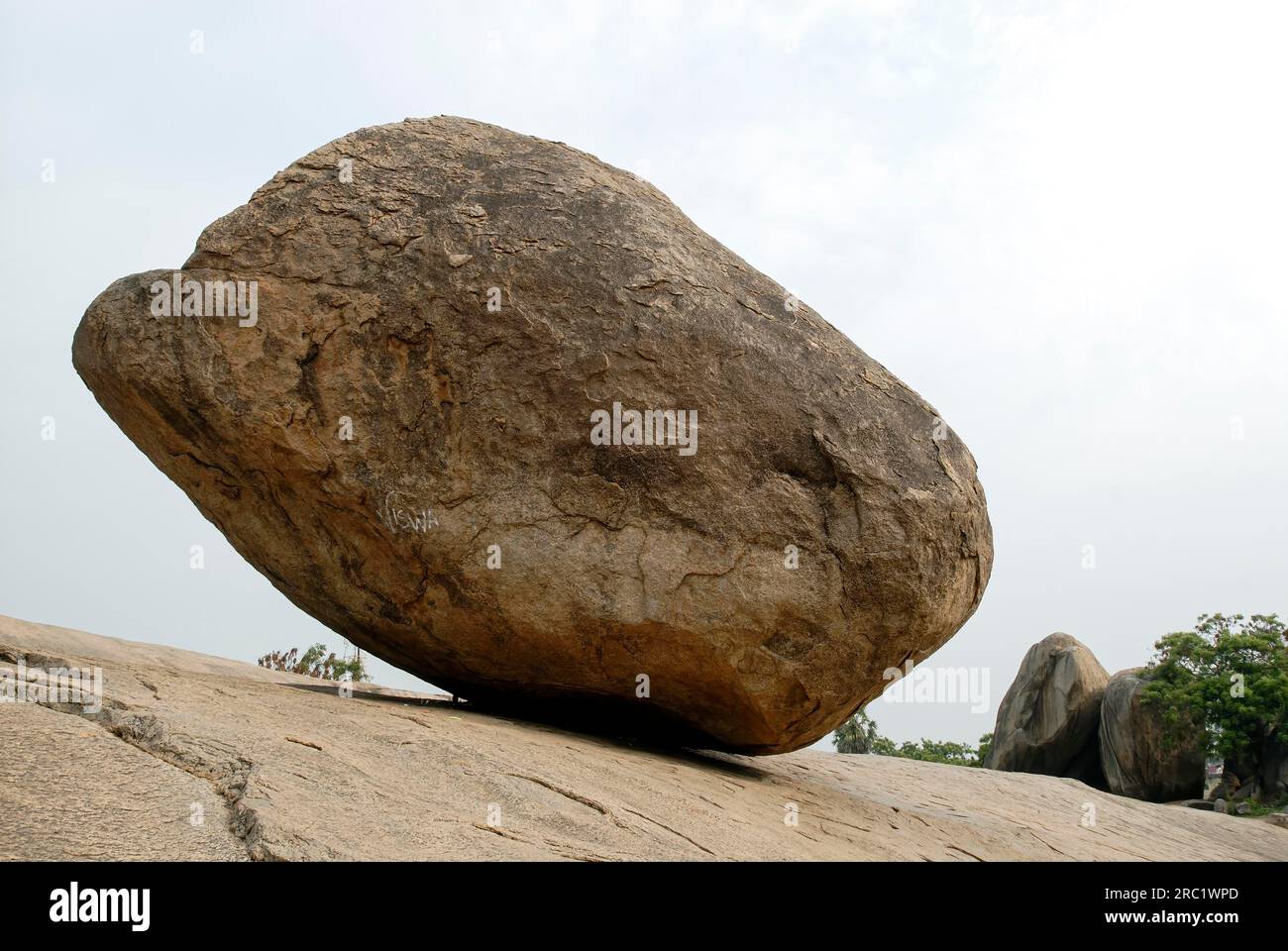 Krishna butter ball natural boulder in Mahabalipuram Mamallapuram near Chennai, Tamil Nadu, South India, India, Asia. UNESCO World Heritage Site Stock Photo
