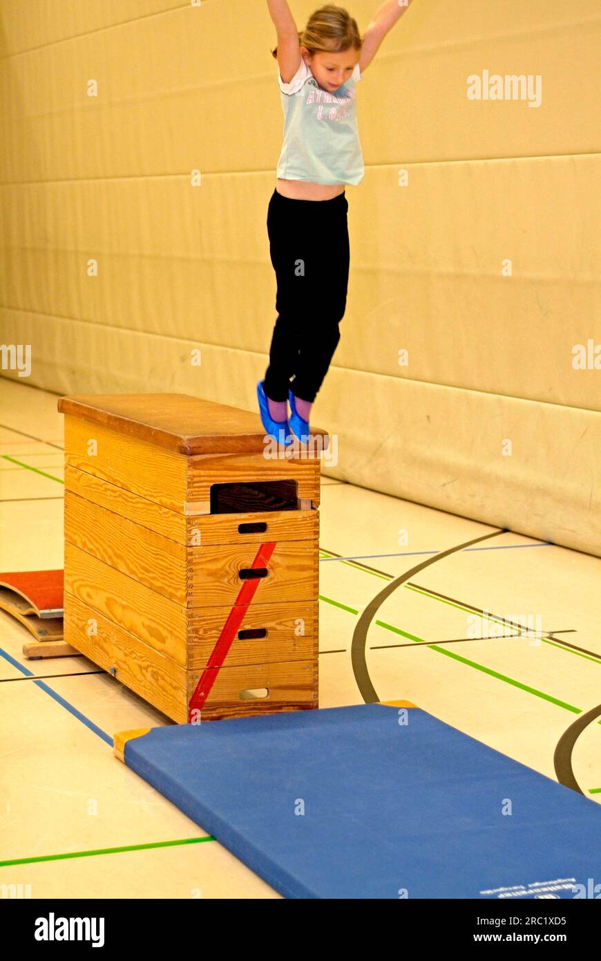 Girl jumps from box, gymnasium, Oberstdorf, Bavaria, sports equipment