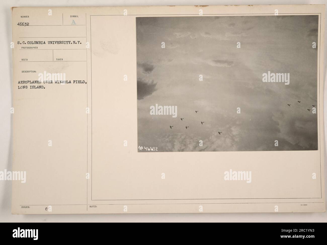 A group of airplanes flying over Mineola Field on Long Island, captured