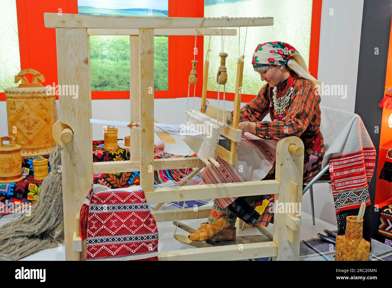 Caucasian woman weaving, weaver, handwork, loom Stock Photo - Alamy