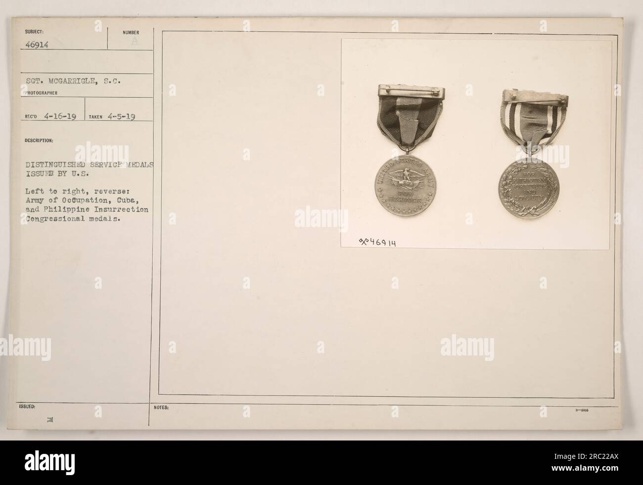 Left to right, reverse: This photograph displays three distinguished service medals issued by the U.S. military. The first medal, on the left, is the Army of Occupation Congressional Medal. In the middle, we have the Cuba Congressional Medal. Lastly, on the right, is the Philippine Insurrection Congressional Medal. Stock Photo