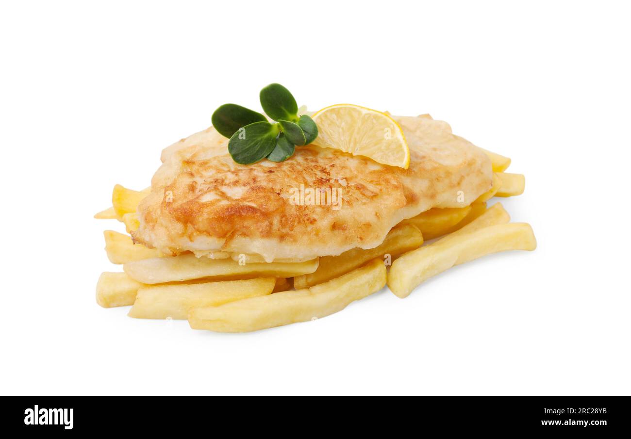 Tasty fish in soda water batter, greens, lemon slice and potato chips