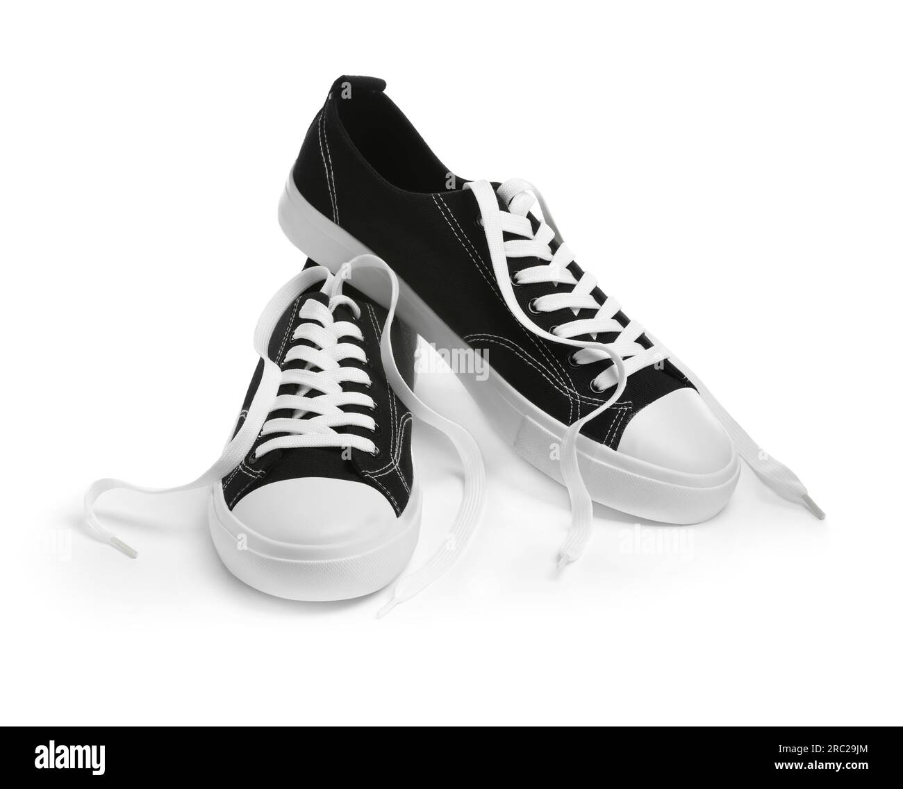 Pair of black classic old school sneakers isolated on white Stock Photo
