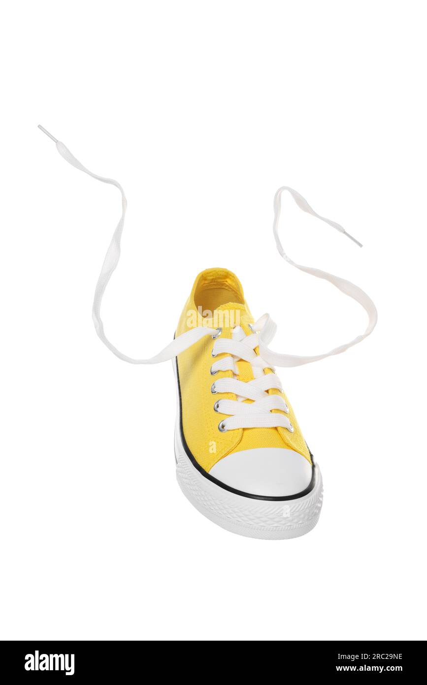 Yellow classic old school sneaker isolated on white Stock Photo
