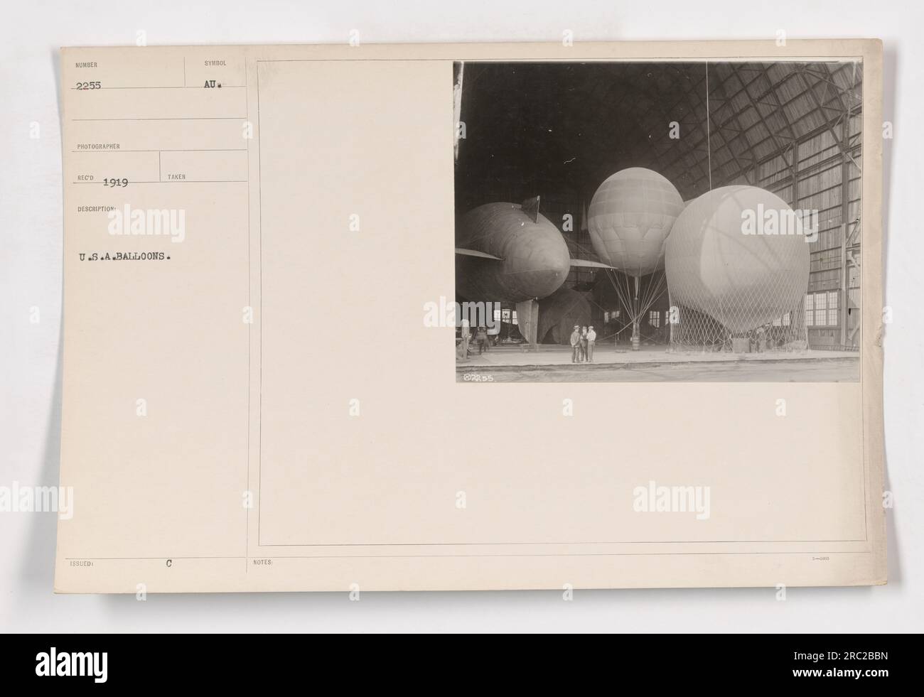 Caption: 'This photograph, taken in 1919 by photographer NEGD, showcases American military activities during World War One. The image captures U.S.A. balloons used in the war effort. The symbol AU is visible on the balloons, denoting their purpose. The photograph offers a glimpse into the notable role of balloons during this period.' Stock Photo