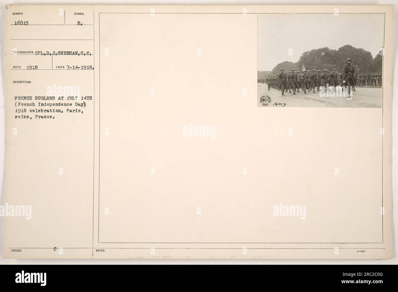 French buglers perform at the July 14, 1918 celebration of French Independence Day in Paris, France. The photograph, taken on July 14, 1918, was captured by CPL D.J. Sheehan of the Signal Corps. Photograph number 16013 in the collection represents this event. Stock Photo