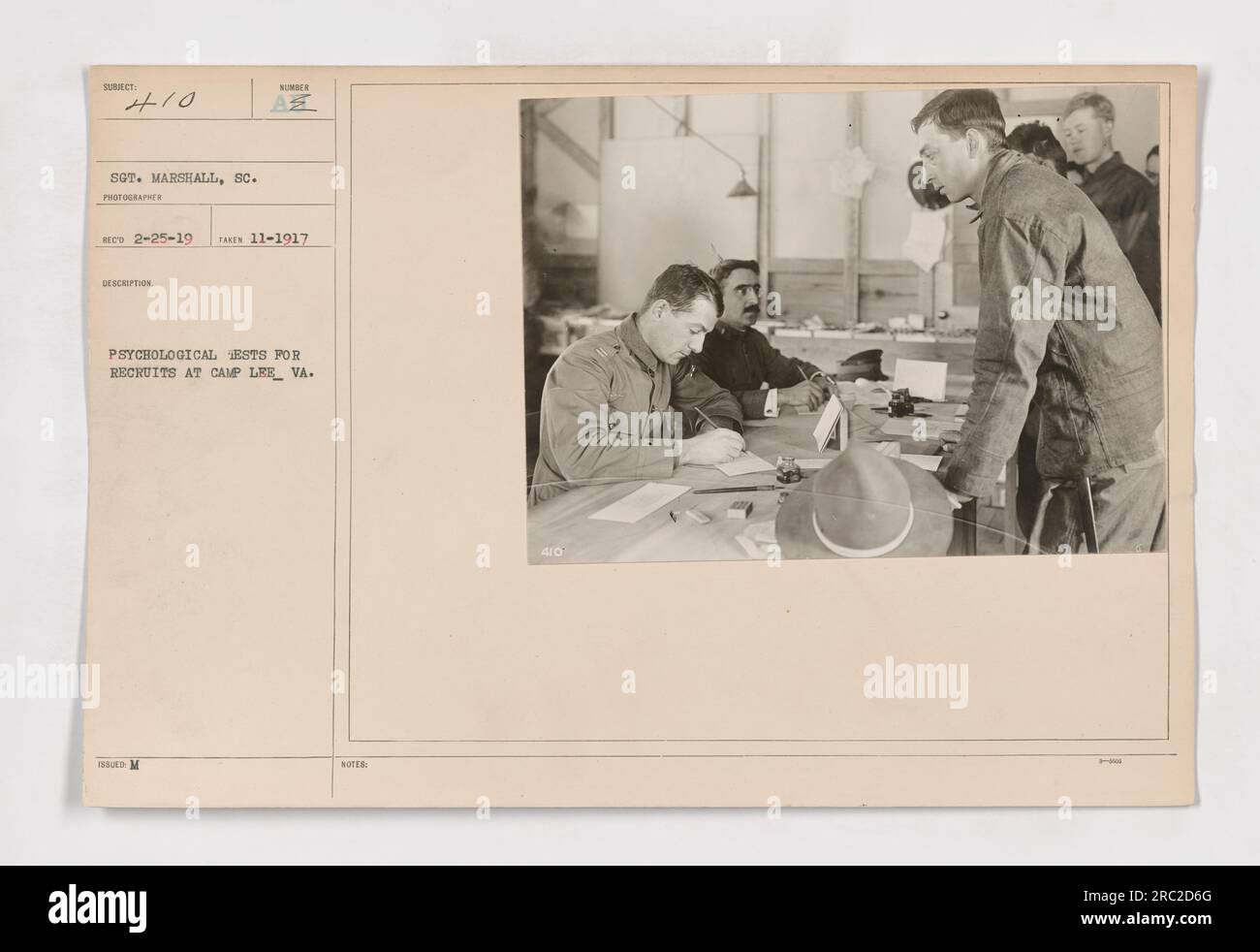 Psychological test being conducted on a recruit at Camp Lee, VA during World War I. The tests aimed to assess the psychological abilities and aptitudes of potential soldiers. This photo was taken by Sgt. Marshall in November 1917 as a part of the examination process for new recruits. Stock Photo