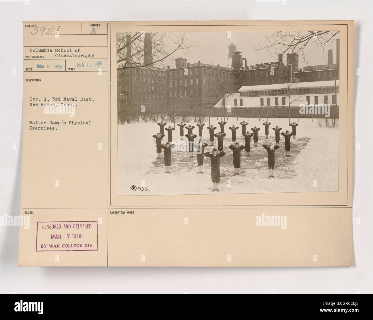 Group of soldiers participating in Walter Camp's physical exercises at Columbia School of Cinematography in New Haven, Connecticut. The picture was taken in March 1918, and it was censored and released by the War College Division on March 7, 1918. Stock Photo