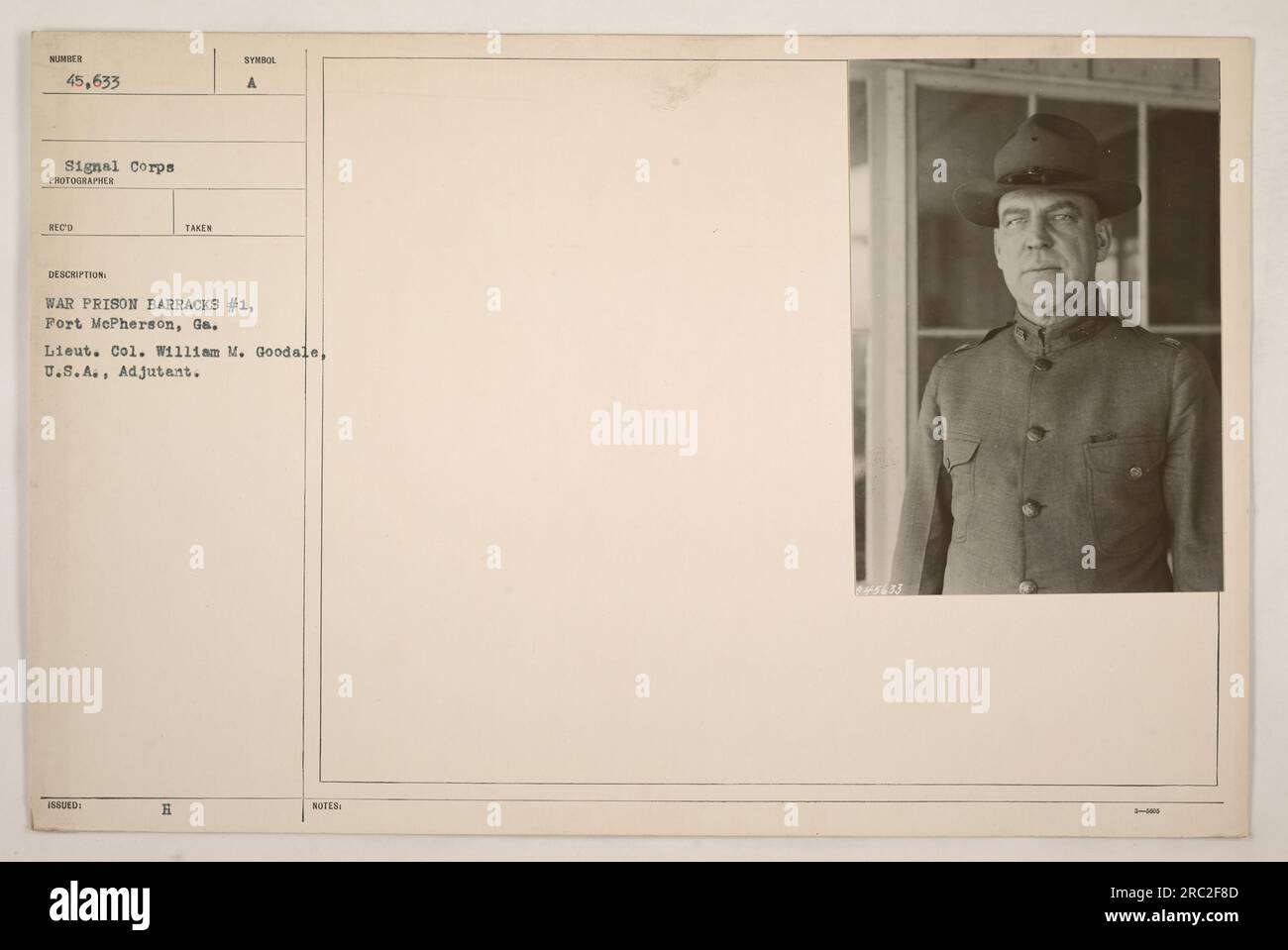 https://c8.alamy.com/comp/2RC2F8D/the-photograph-shows-war-prison-barracks-1-at-fort-mcpherson-georgia-lieutenant-colonel-william-m-goodale-of-the-usa-is-wearing-an-adjutant-uniform-and-the-prisoner-in-the-foreground-is-numbered-45633-the-description-notes-that-this-photograph-was-taken-by-reco-and-is-from-the-signal-corps-2RC2F8D.jpg
