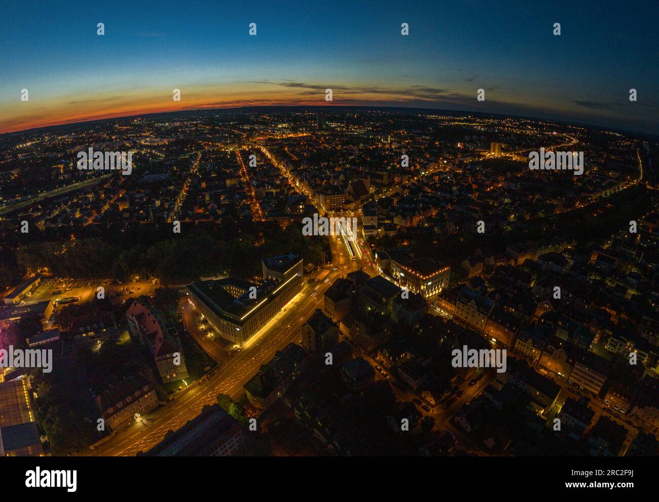 Beautiful nightfall over Augsburg, view to the district called Oberhausen Stock Photo