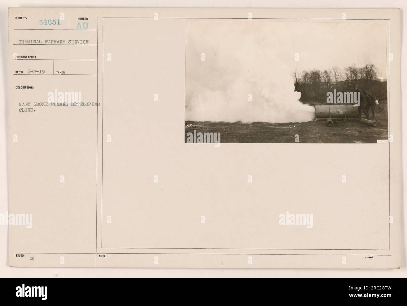 Navy smoke funnel emitting a cloud, captured by photographer of the