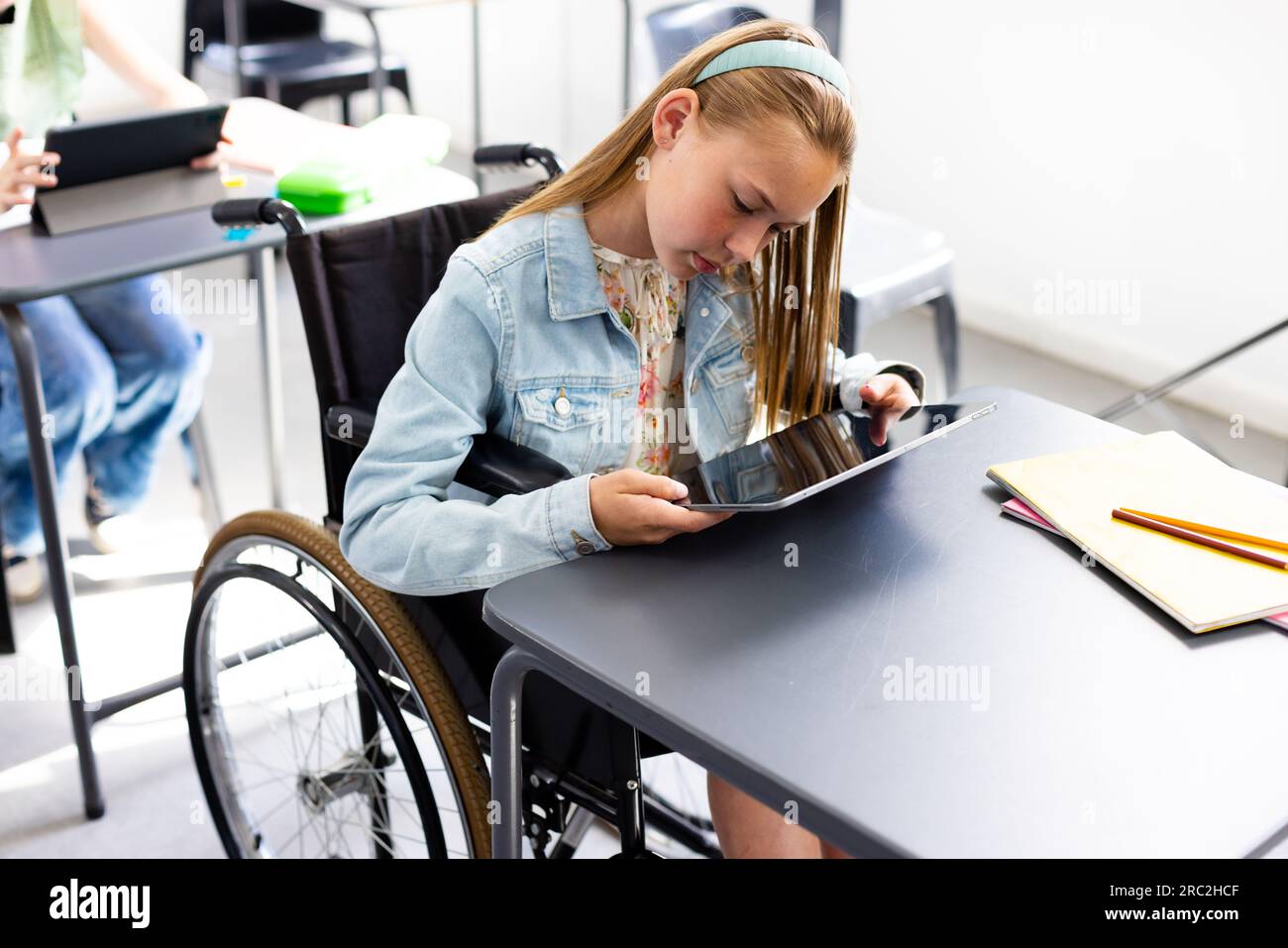 Children wheelchair classroom hi-res stock photography and images - Page 2  - Alamy, image size:1300x957