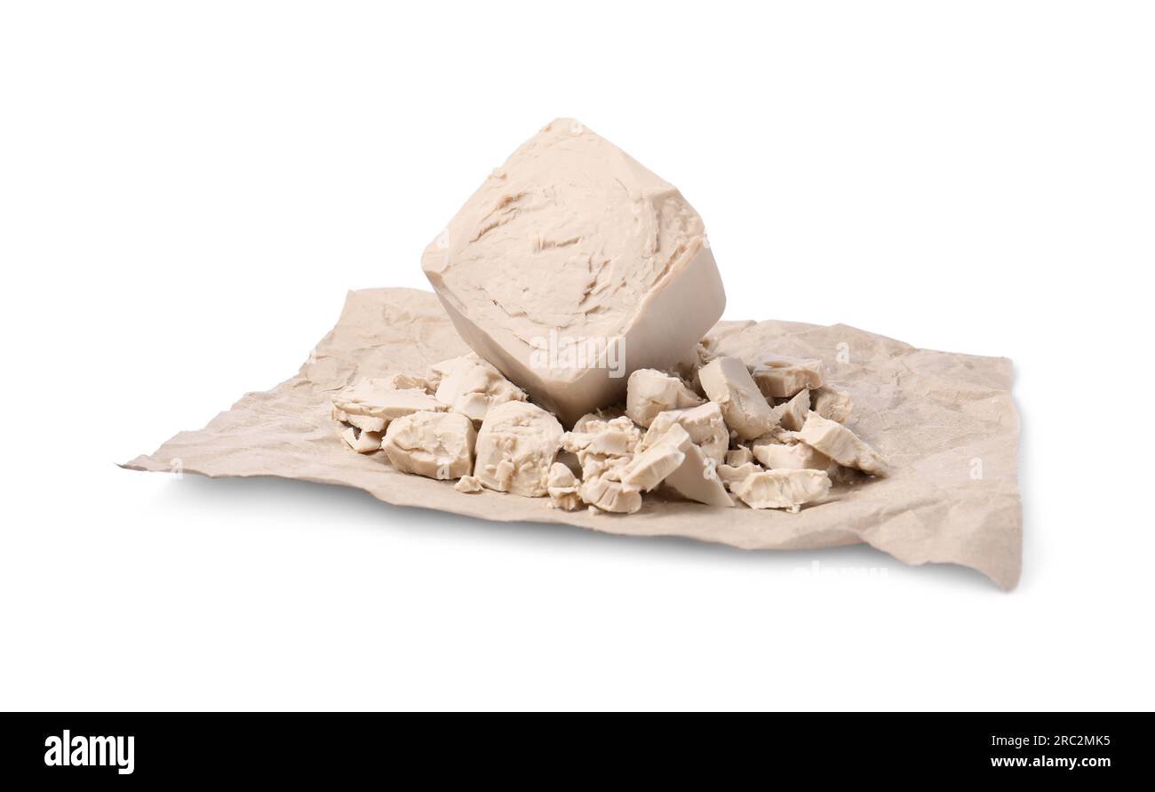 Pieces of compressed yeast isolated on white Stock Photo Alamy