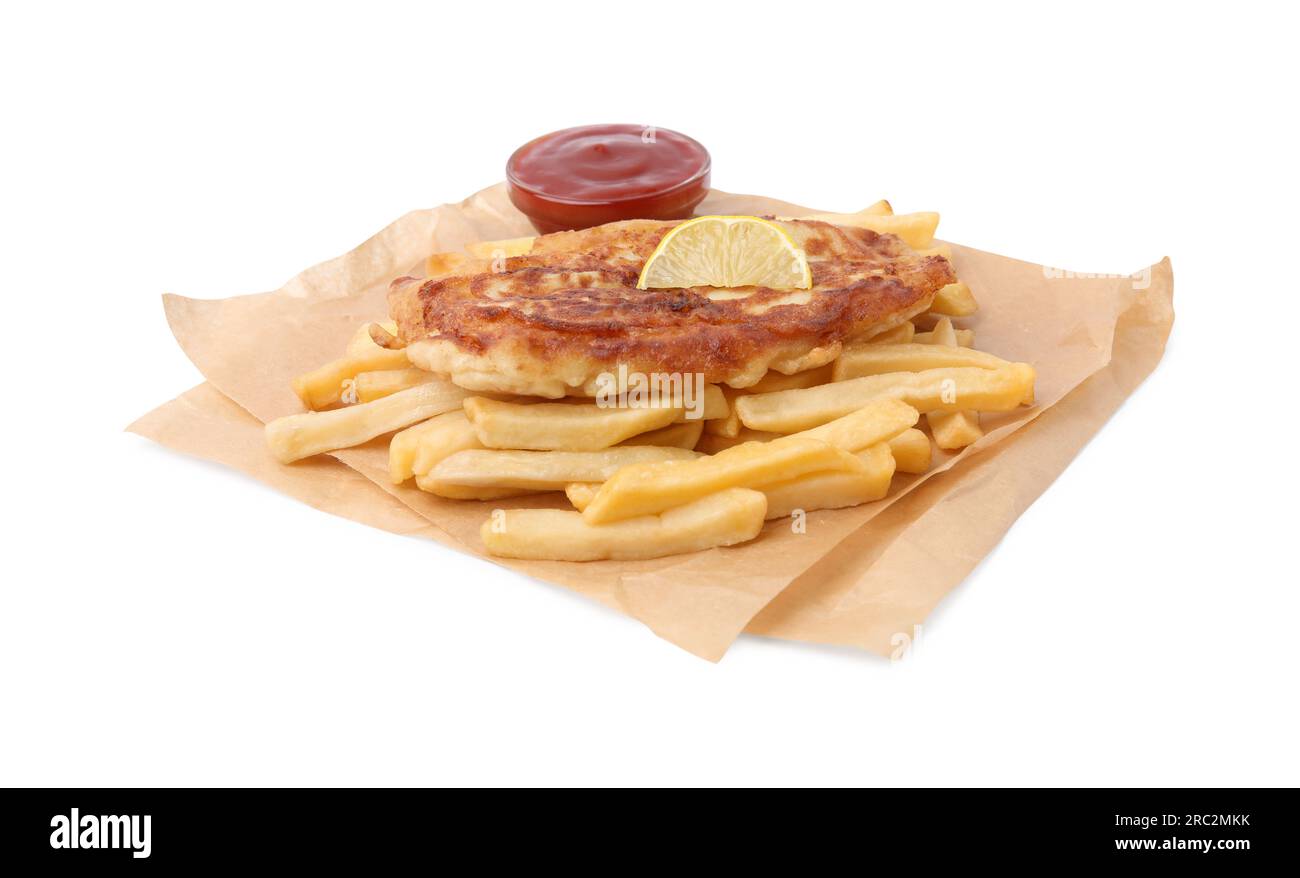 Tasty fish in soda water batter, lemon slice, potato chips and tomato