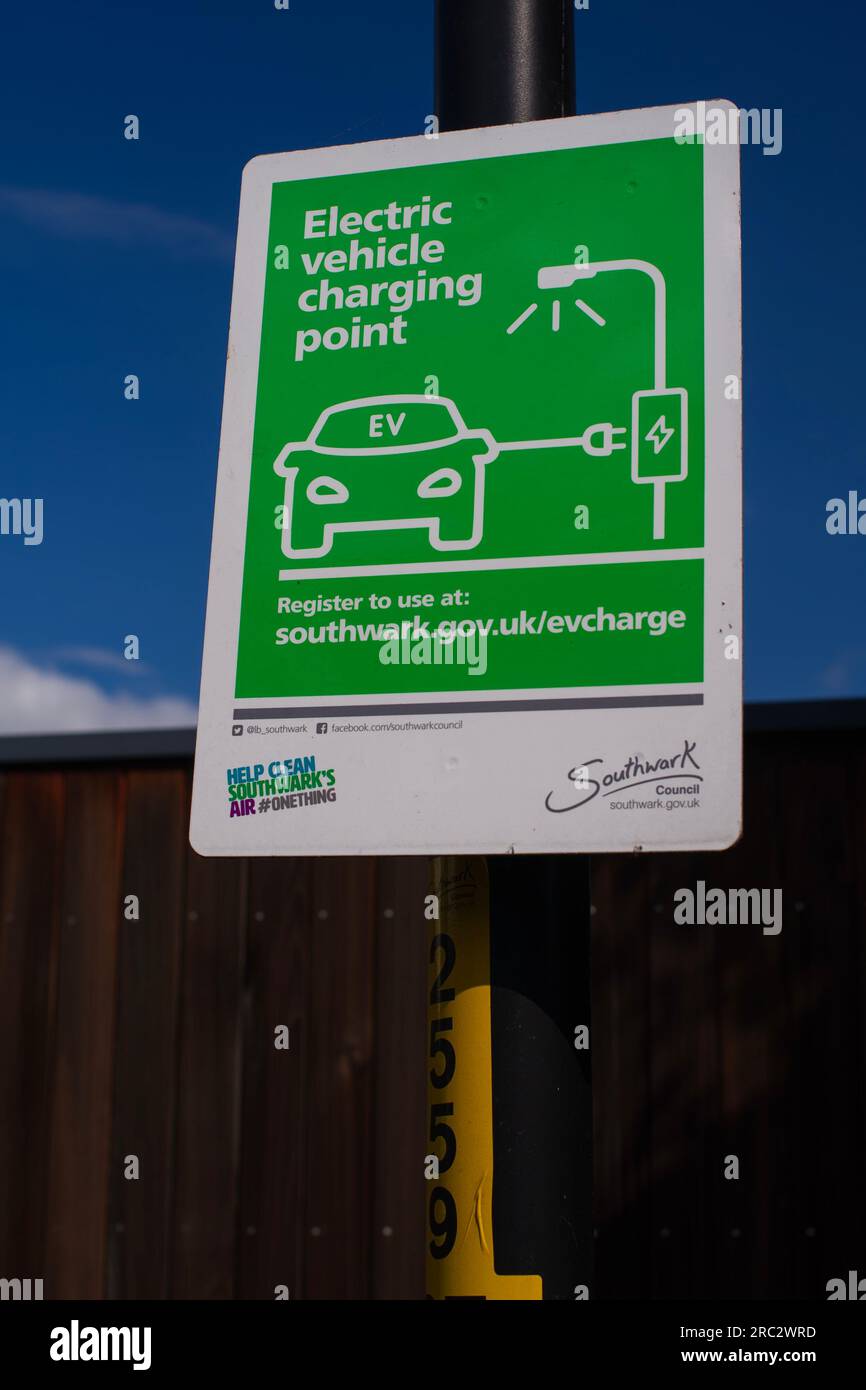 Electric car charging point on street Stock Photo - Alamy