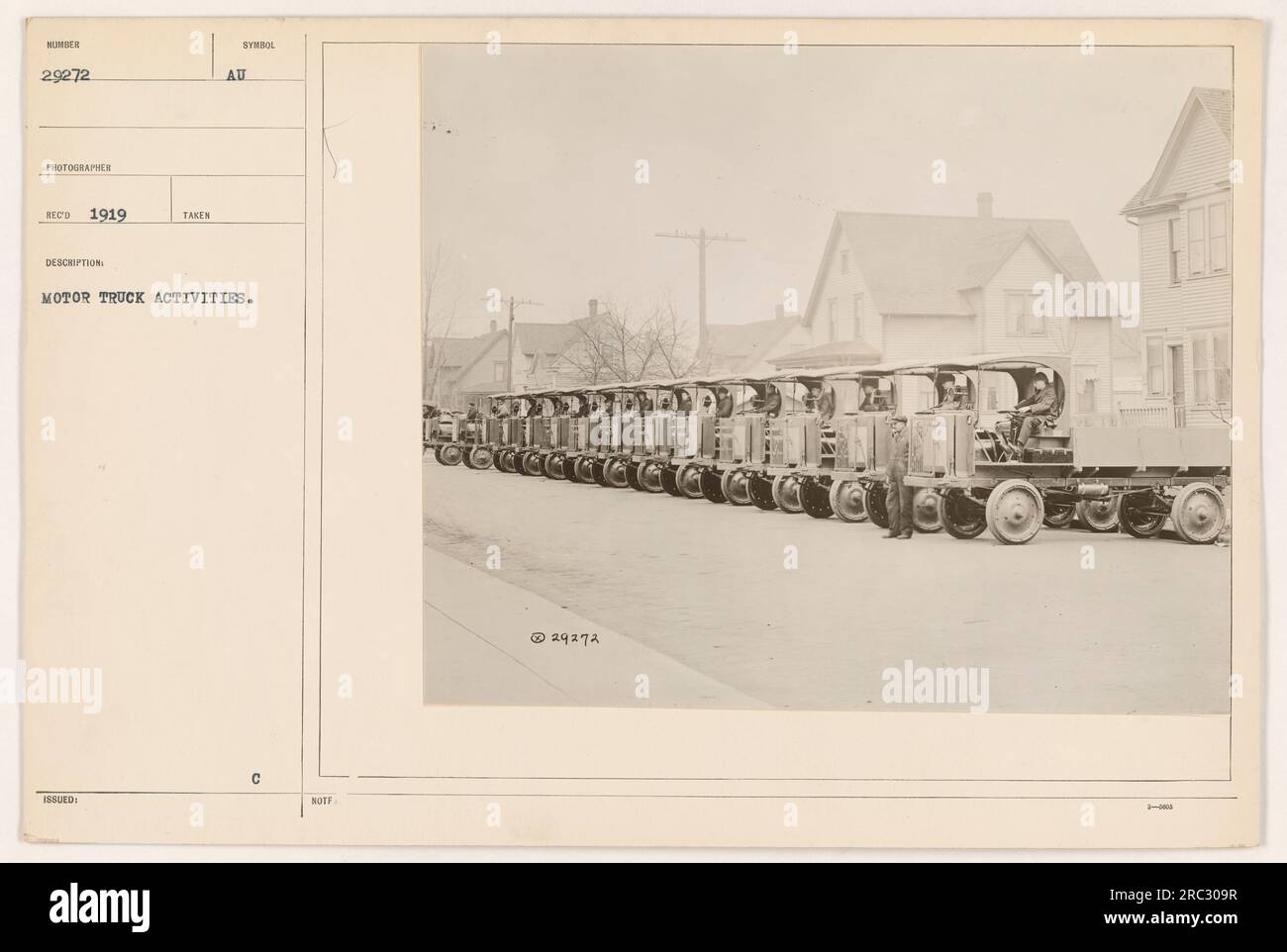 American soldiers driving motor trucks during World War I. The soldiers are engaged in transportation activities, moving equipment and supplies on the battlefield. The photo was taken in 1919, capturing the symbol of the American military's motor transport activities during that time. Stock Photo