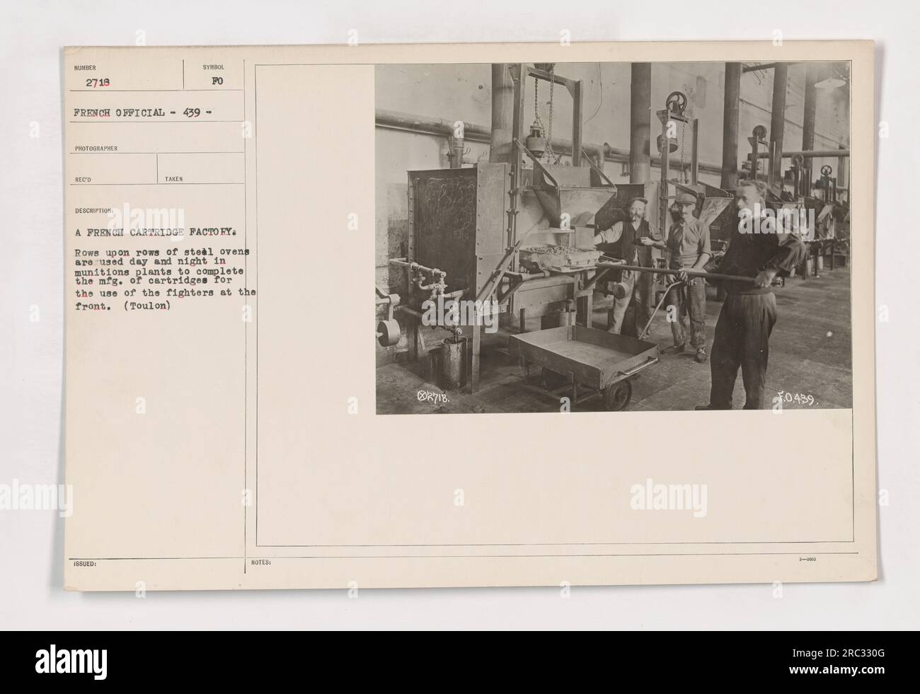 Rows of steel ovens are seen at a French cartridge factory. These ovens operate day and night in munitions plants, contributing to the manufacturing of cartridges for the front-line fighters. This image was taken in Toulon during World War I. Stock Photo