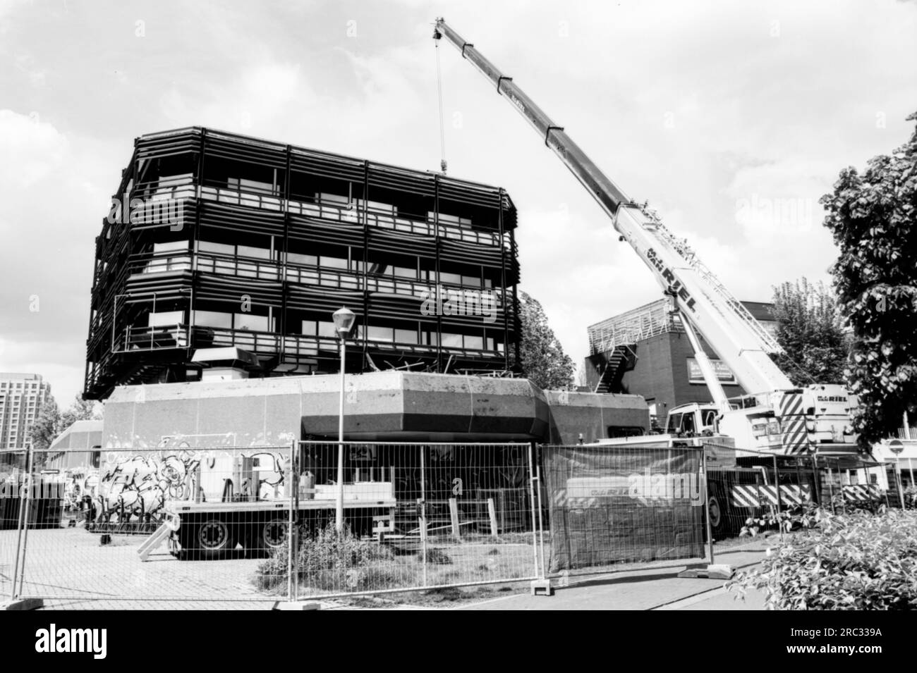 Demolishing the iconic 'Blue Building', originally constructed during the 1970's to house the offices of Social Services of the Municipality. Tilburg, Netherlands. Stock Photo