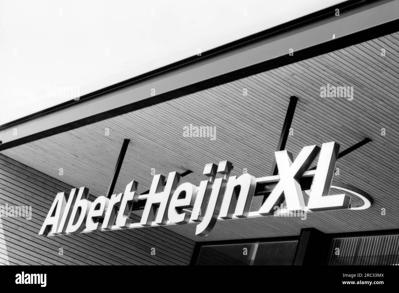 Brand above the entrance of Albert Heijn XL Super Market. Tilburg, Netherlands. Stock Photo