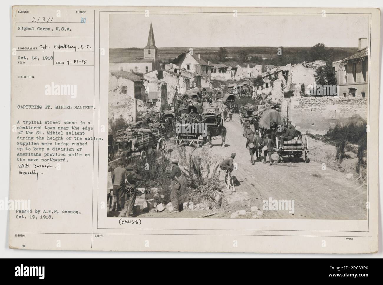A typical street scene in a town near the St. Mihiel salient during the height of the action. Supplies being rushed to keep Americans provided while moving north. 26th Division. Mol. Stock Photo