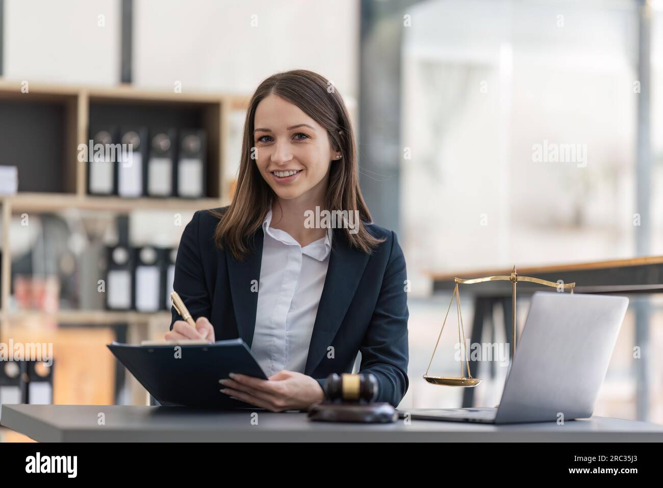 Female judge working on computer hi-res stock photography and images ...