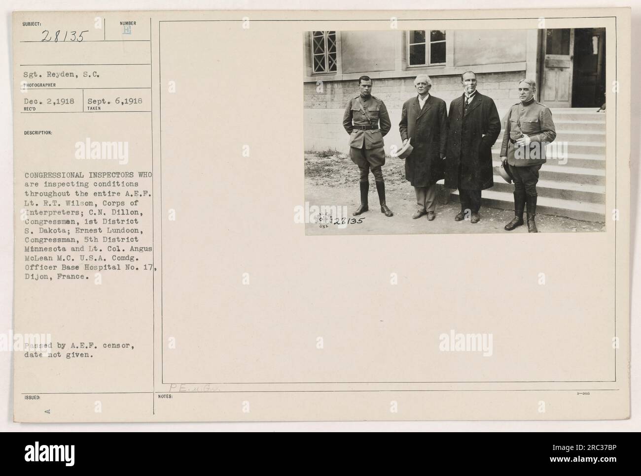 Congressional inspectors conducting a site visit at Base Hospital No. 17 in Dijon, France during World War One. Pictured are Lt. R.T. Wilson, Corps of Interpreters; C.N. Dillon, Congressman, 1st District South Dakota; Ernest Lundoon, Congressman, 5th District Minnesota; and Lt. Col. Angus McLean M.C. U.S.A., Commanding Officer of the hospital. Photograph taken on September 6, 1918. Stock Photo