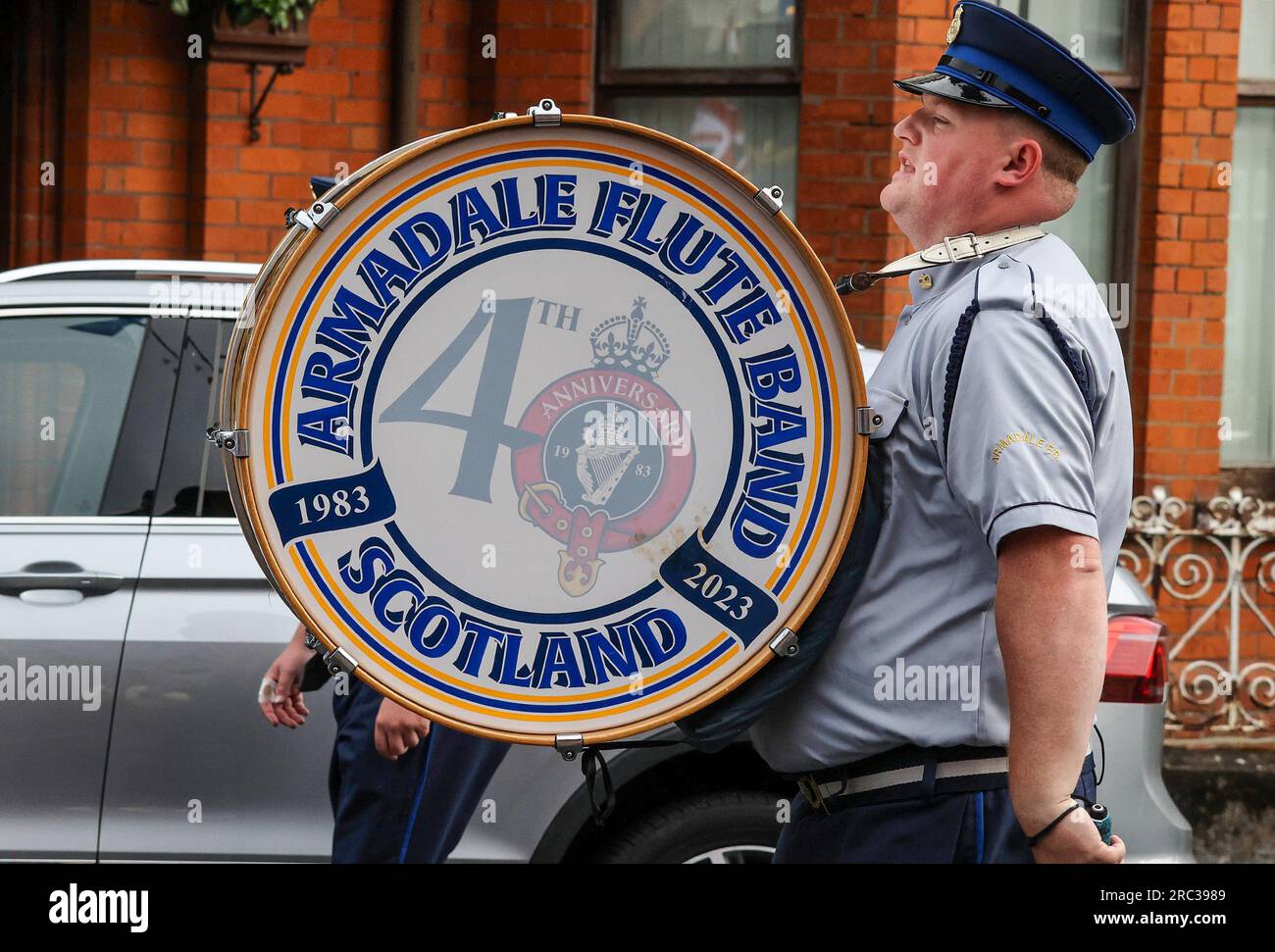 Lurgan, County Armagh, Northern Ireland.12 Jul 2023. The Twelfth of July is marked by Orange Order parades across Northern Ireland. Lurgan District left their headquarters at Brownlow House before parading up the town to the war memorial ahead of the main County Armagh demonstration being held in the town this year.The parades across Northern Ireland mark the victory of William of Orange over James at the Battle of the Boyne in 1690. Credit: CAZIMB/Alamy Live News. Stock Photo