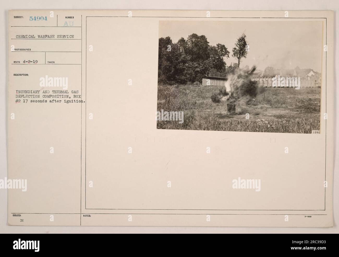 Image showing an incendiary and thermal gas deflection composition, specifically box #2, taken 17 seconds after ignition. The photograph was captured by Chemical Warfare Service photographer Reed on April 2, 1919. The image is part of a collection from American military activities during World War I. Photograph description and issued notes were provided in 1989. Stock Photo