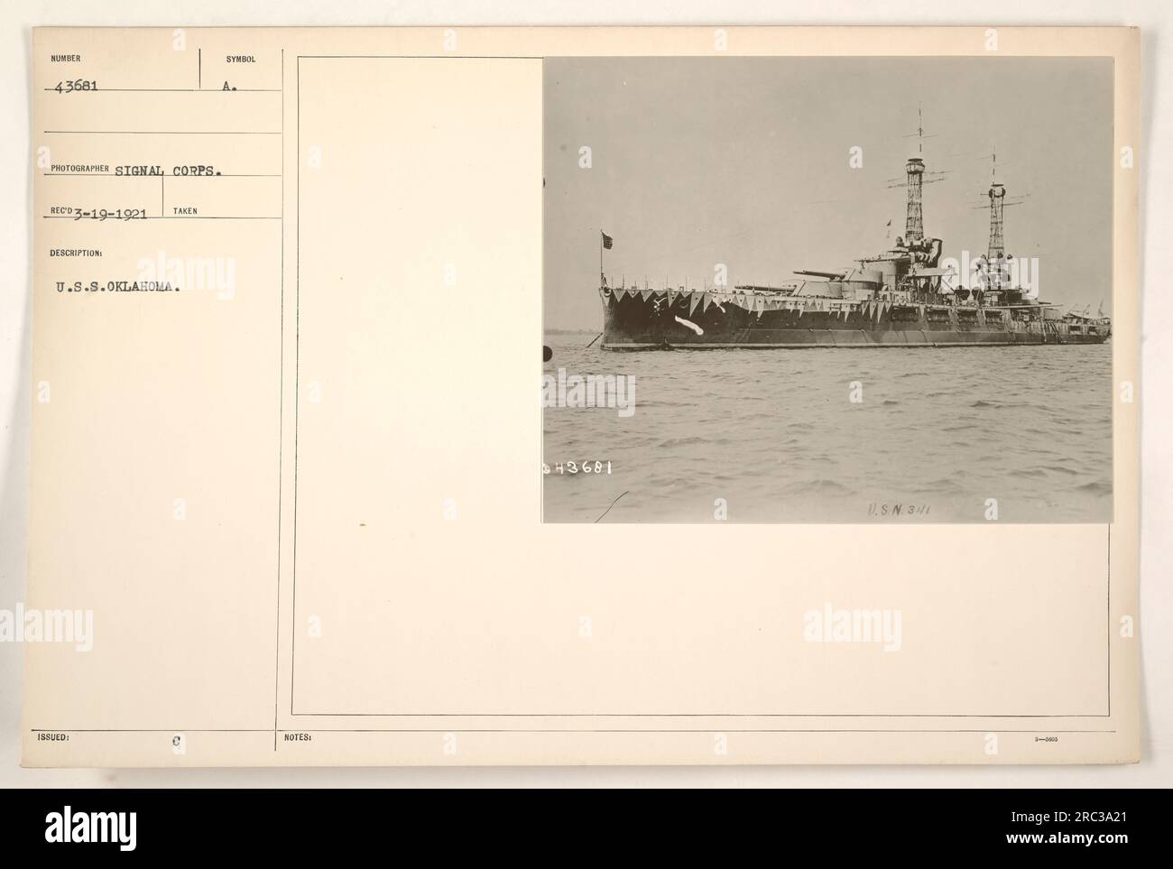 U.S.S. Oklahoma during World War One. This image, numbered 43681 and taken by the Signal Corps photographer, depicts the ship in action. The photo was released on March 19, 1921, and bears the symbol of the A.C. Notes indicate that it features U.S.N. 31/1 Keer. Stock Photo