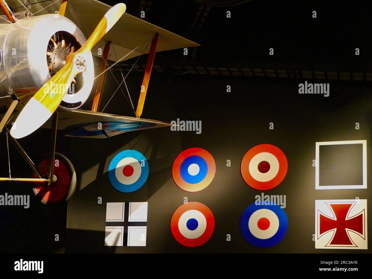 Sopwith Pup Reproduction WW1 fighter plane suspended with insignia from air forces on a wall in the Museum of Flight Seattle Washington State USA Stock Photo