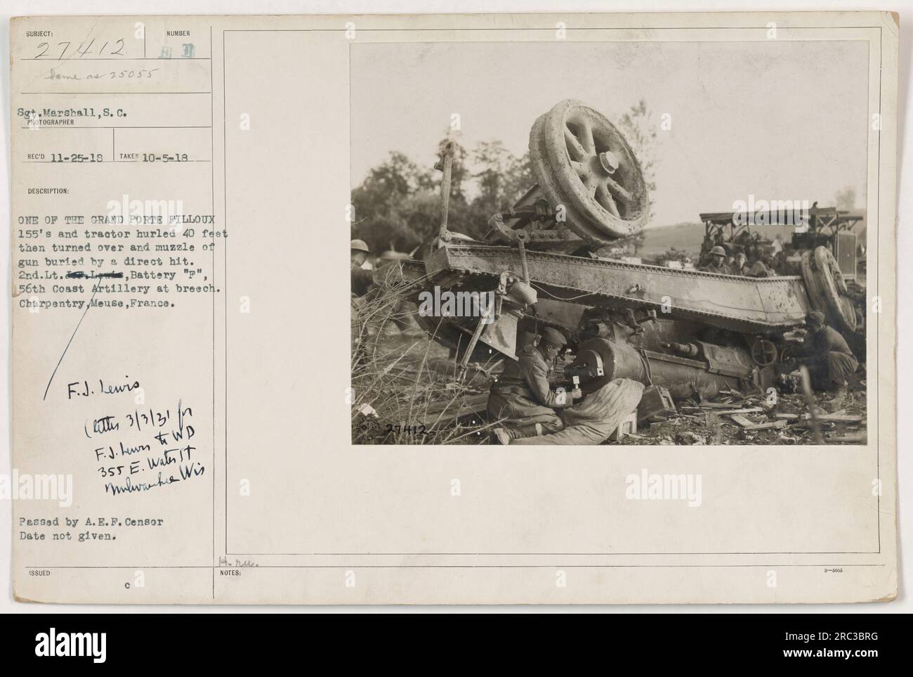 50-word Caption: 2nd Lt., Battery 'p', 56th Coast Artillery, supervising as a direct hit buries the muzzle of the Grand Porte Filloux 155's gun under wreckage. The tractor and cannon are thrown 40 feet before tipping over. Photograph taken in Charpentry, Meuse, France, during World War One. Officially approved by A.E.F Censor. Stock Photo